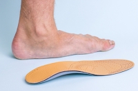 How Orthotic Insoles Help Adults with Flexible Flatfoot